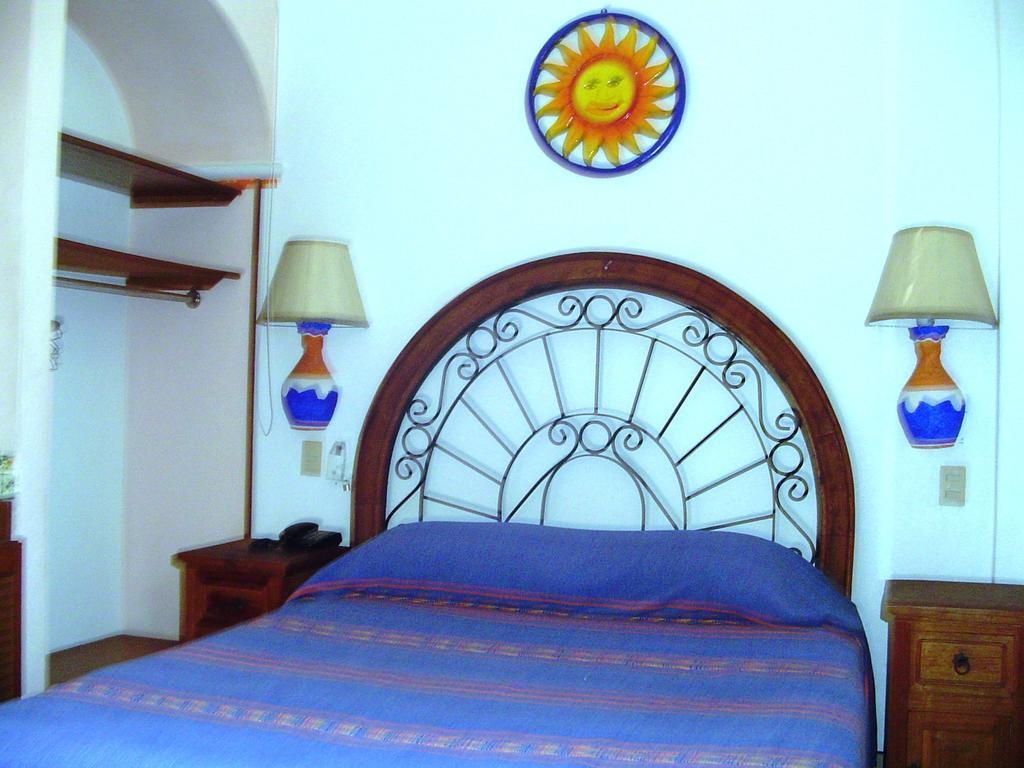 Hotel & Suites Coral Puerto Vallarta Szoba fotó